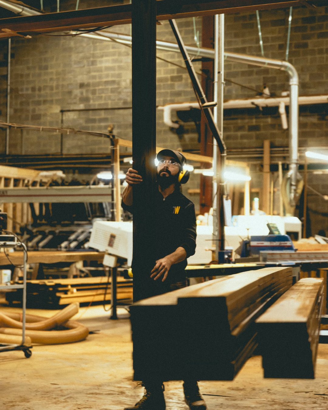 ThermalWood Canada worker inspecting a board